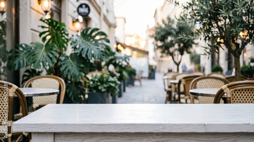 Outdoor Cafe Terrace with White Table and Green Plants for Web Design