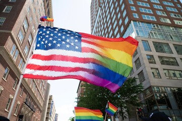 American Flag Pride Flags waving in city