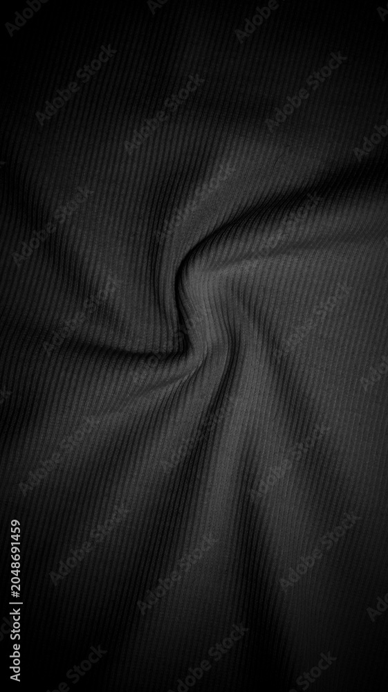 Fototapeta premium Elegant Black Fabric with Subtle Texture and Soft Drapery Effect