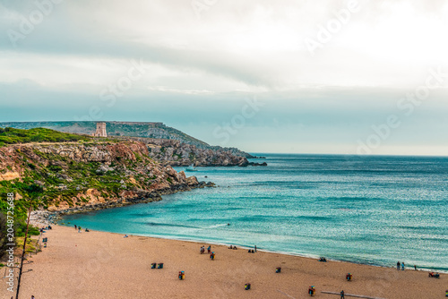Schilderij op canvas Landscape of the golden bay, malta with chalky cliffs, clear blue Mediterranean