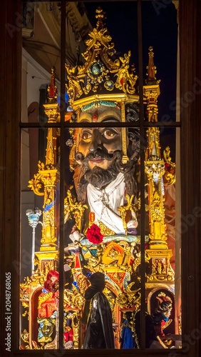 Intricate stained glass religious church window art.