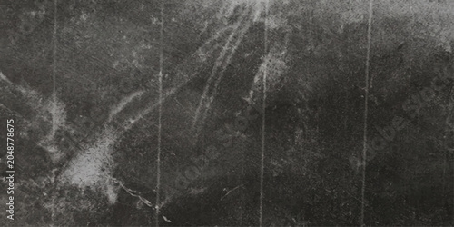 Fotografia A vintage black and white photograph captures a mysterious, abstract pattern of scratches and smudges, evoking a sense of aged texture and enigmatic distress