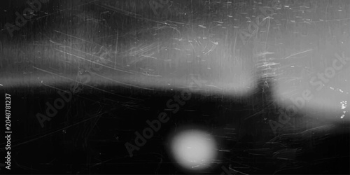 Foto An eerie, abstract image of a lighthouse shrouded in mist, evoking a sense of mystery and isolation, with a grainy, vintage texture