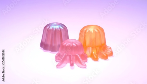 Three colorful, translucent, gelatinous, jellyfish-shaped confections on a soft gradient background