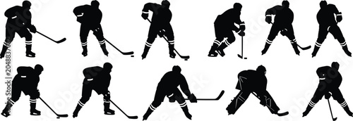 Canvas Print Ten black silhouettes of ice hockey players performing skating shooting passing