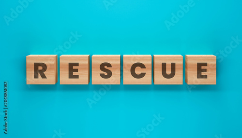 Fotografie The Word RESCUE in Wooden Blocks