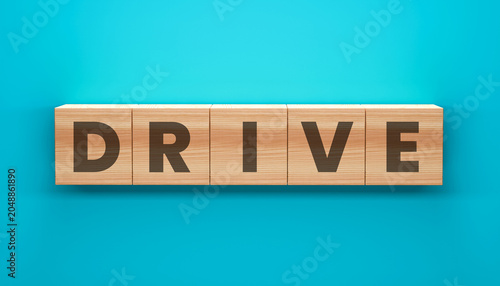 Schilderij op canvas DRIVE Word Blocks on Teal Background: The word DRIVE spelled out on wooden blocks, symbolizing motivation and forward momentum, set against a vibrant teal background
