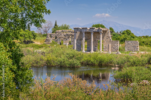 Fotografie Ancient Greek ruins of the Miletus complex standing by a scenic reflecting pool