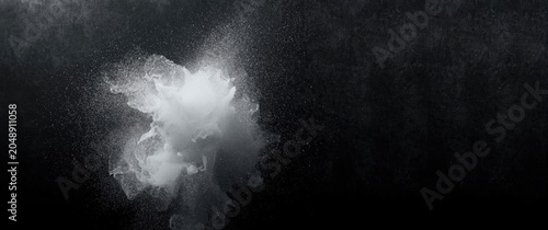 Fine white dust plume erupt...