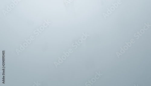 Softly lit grey plastic tex...