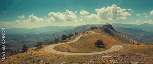 Panel kuchenny z motywem Meandering road cutting across broad mountain panorama