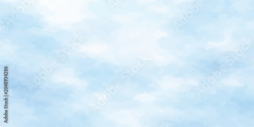 Fotografía A gentle watercolor painting depicts soft, diffused clouds in a pale blue sky, evoking a sense of peace and serenity