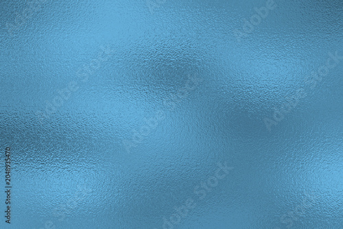 Steel blue metallic foil texture background with cold shiny chrome reflection surface