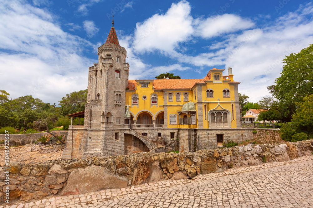 Fototapeta premium Historic villa with a stone tower in Cascais, Portugal.
