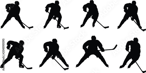 Photography Eight black silhouettes of hockey players arranged in two rows performing skatin