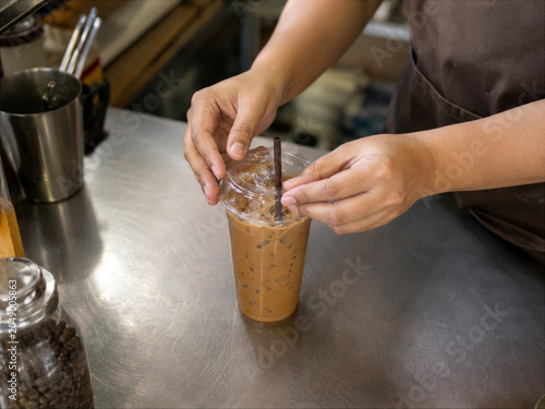 Barista Preparing Iced Coffee in Independent Cafe