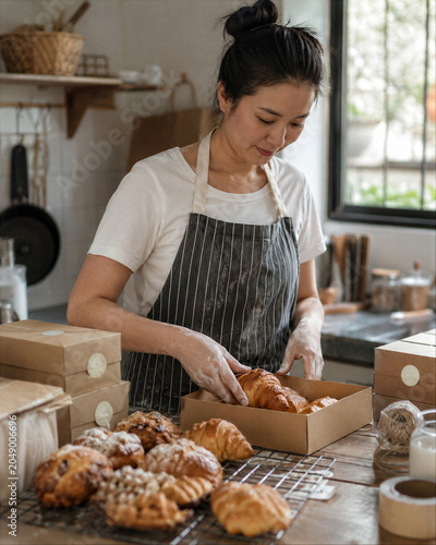 Small Bakery Packing Pastries for Customer Orders