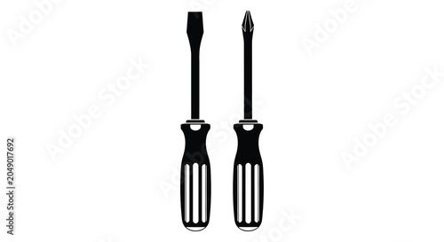 Fotografija Two screwdrivers with flathead and phillips heads black silhouette