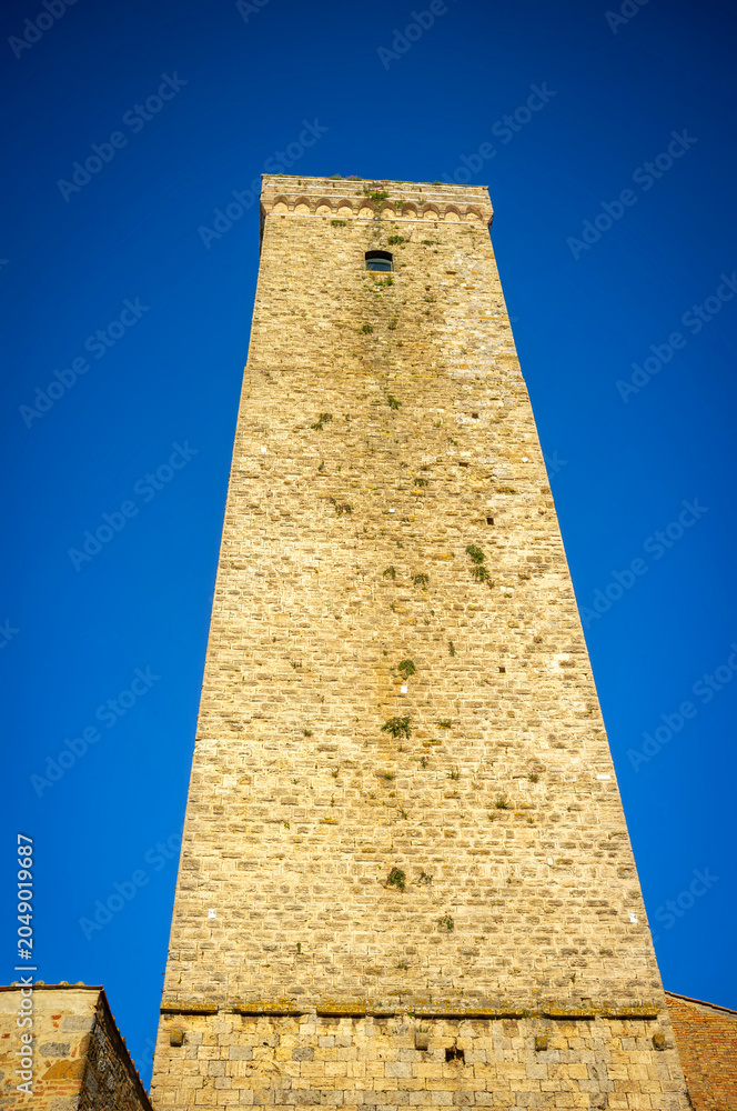 Naklejka premium View of the famous reinassance towers of San Gimignano, medieval village of Tuscany (Province of Siena, Italy); is world famous for white wine production (named 
