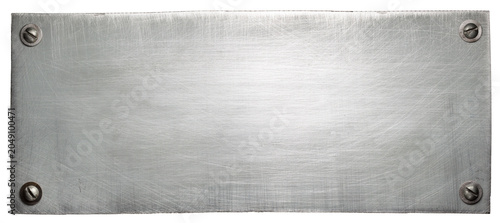 Brushed metal plate with four screws against a white background for copy space