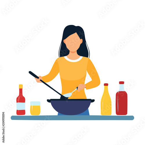 Woman cooking in a wok with ingredients