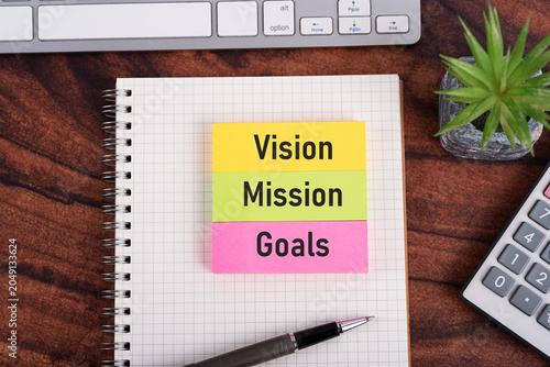 Strategic Planning Concept with Goals, Mission, and Vision text on notepad