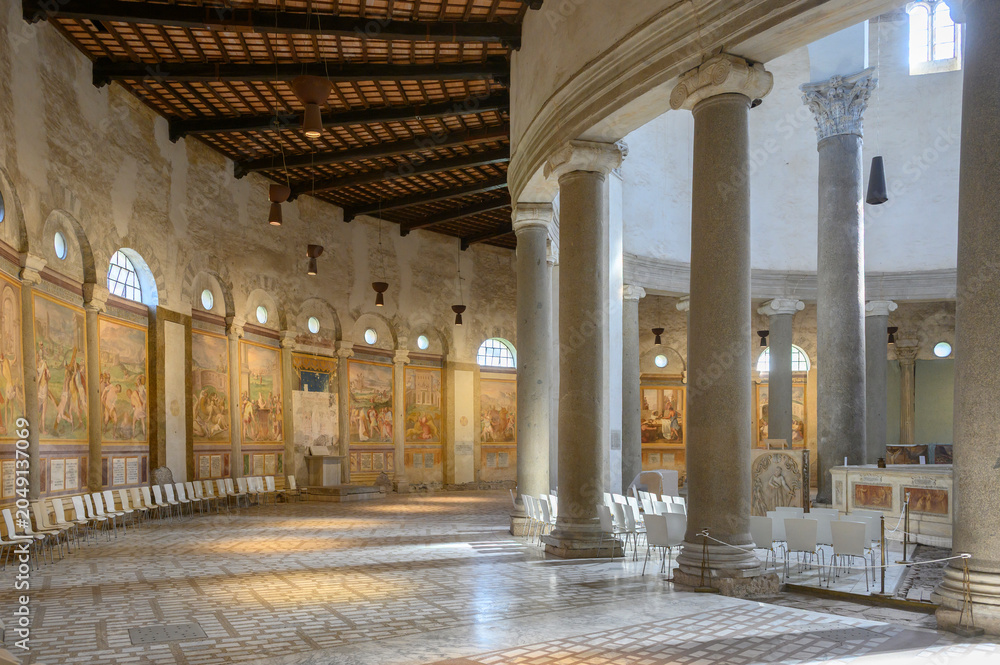 Obraz premium Basilica of Santo Stefano Rotondo on the Caelian Hill in Rome, Italy. Circular nave walls decorated with Renaissance martyrdom frescoes