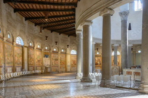 Basilica of Santo Stefano Rotondo on the Caelian Hill in Rome, Italy. Circular nave walls decorated with Renaissance martyrdom frescoes
