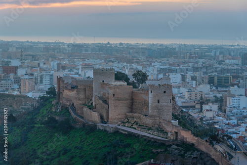 Daytime close view of Alcazaba fortress in Almeria overlooking urban cityscape
