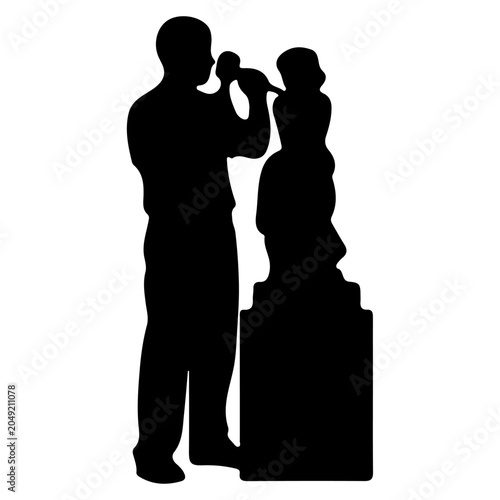 Cuadro en lienzo Silhouette of a sculptor chiseling a statue.