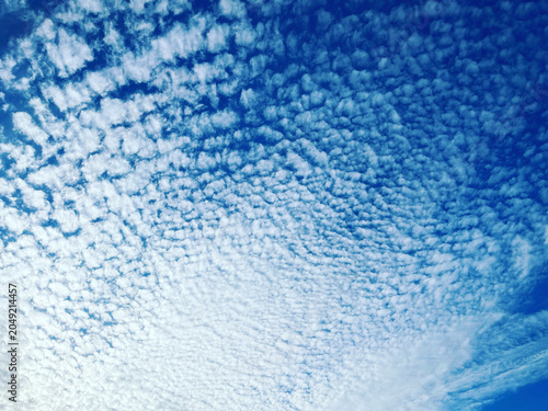 Bild auf Leinwand Beautiful blue sky with white cirrocumulus clouds and natural atmosphere in autu