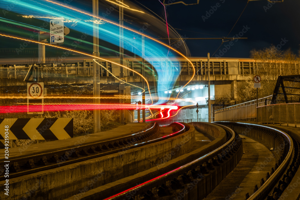 Fototapeta premium Dublin Night Train Light Trails On Tracks