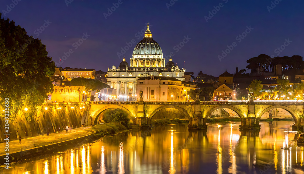 Fototapeta premium Saint Peter's Basilica illuminated at night with Ponte Sant'Angelo and the Tiber River in Rome, Italy, travel, landmark