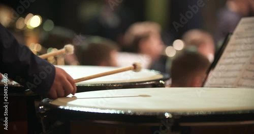 Hand Playing Timpani in an Orchestra