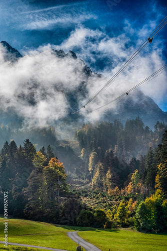 Zugspitze Alpine Road Through Cloudy Mountain Forest