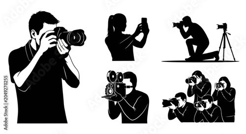 Fotografia Photographers at work with cameras.