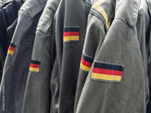 Vintage German Military Uniforms Displayed for Sale