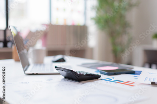 Tableau sur toile Financial accounting calculator report pen graphs and charts Preparing report