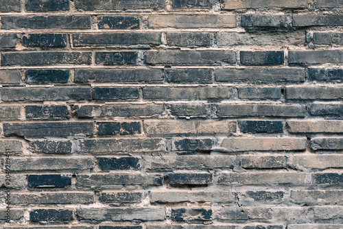 Gray brick wall textured background