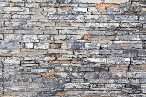 Gray brick wall textured background