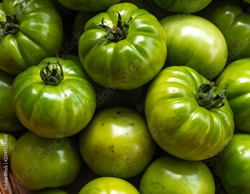 A vibrant bunch of green tomatoes