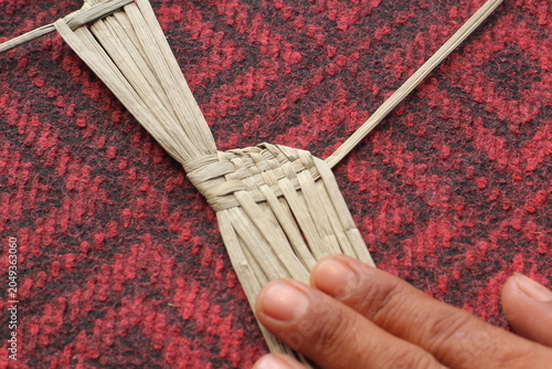 The process of making suket puppets, which are made from a type of grass called mendong