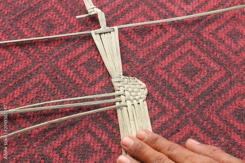 The process of making suket puppets, which are made from a type of grass called mendong