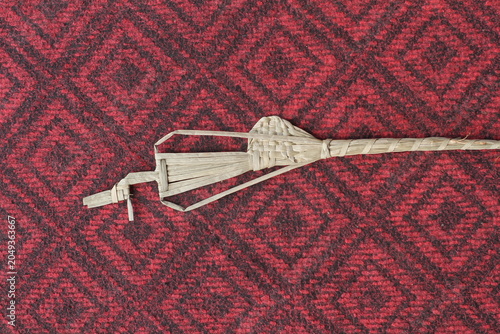 The process of making suket puppets, which are made from a type of grass called mendong