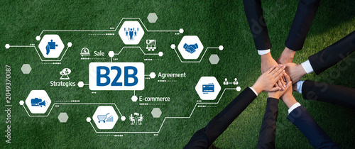 Foto A vibrant image of business professionals collaborating on green grass, illustrating B2B strategies, agreements, and e-commerce concepts in a modern corporate environment