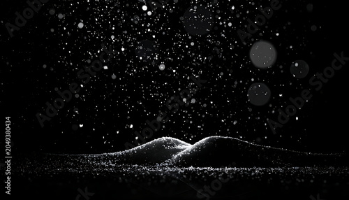 Abstract glowing particles suspended in darkness above a textured, undulating surface, creating a magical, futuristic, or cosmic atmosphere