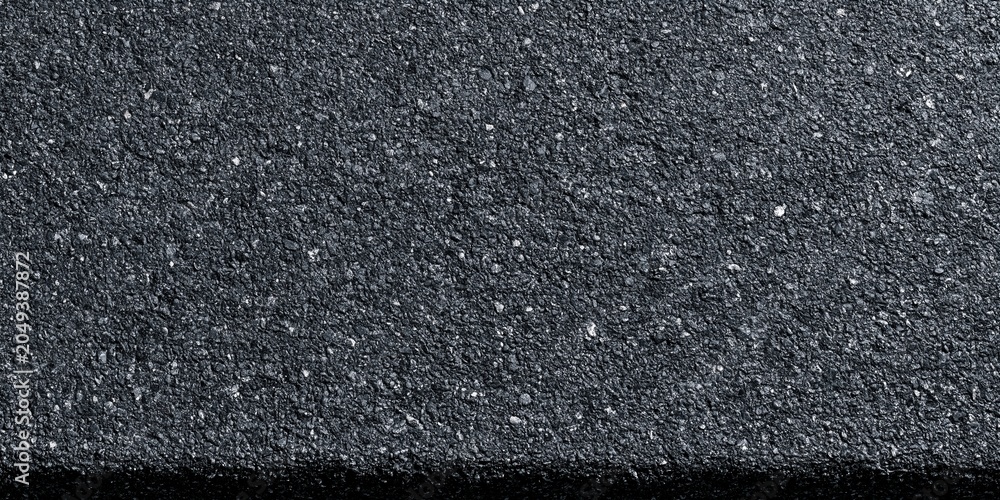 Fototapeta premium Textured Asphalt Road Surface with Fine Gravel and Tiny Stones