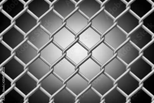 Close up of metal chain link fence texture against dark background with background