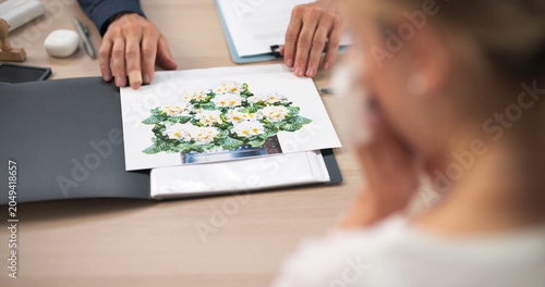 Bild auf Leinwand Funeral Director Supports Female Client Thoughtfully Planning Personalized