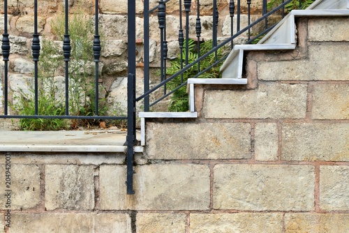 Εκτύπωση καμβά An outdoor staircase featuring modern white marble steps, situated in front of a